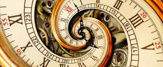 Antique clock spiraling inward, symbolizing time distortion.
